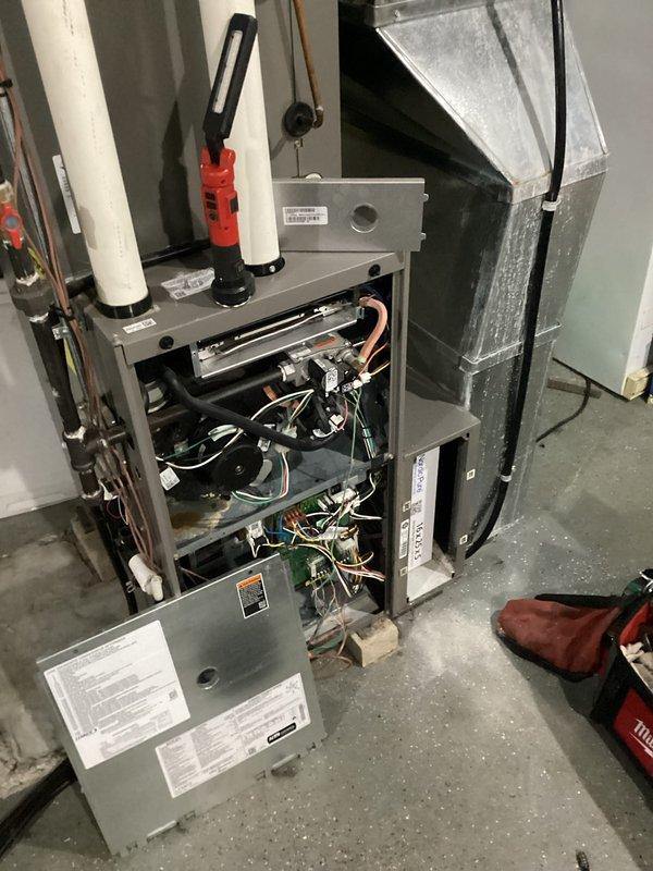 Completed comprehensive AC and furnace tune-up maintenance service. Performed combustion analysis on natural gas furnace, confirming optimal efficiency at 97.9% with safe CO levels at 22 ppm and proper oxygen content at 8.1%. Inspected all internal components, wiring, and circuit boards, verified proper operation of both heating and cooling systems, and discussed duct cleaning options with homeowner.