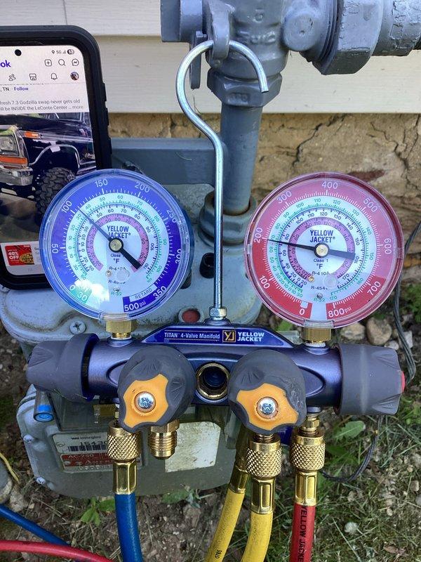Completed scheduled prepaid membership cooling maintenance visit on residential air conditioning system. Performed comprehensive system diagnostics using Yellow Jacket Titan 4-valve manifold gauge set to measure refrigerant pressures and verify proper system operation. Accessed condenser unit electrical compartment to inspect internal components, wiring connections, and control board for signs of wear or damage. Utilized digital multimeter to test electrical values and ensure proper voltage supply to unit. All refrigerant pressures measured within manufacturer specifications, electrical components functioning normally, and system operating efficiently with no deficiencies noted.