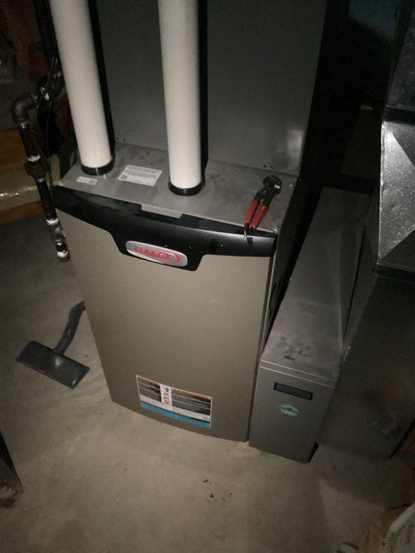 Completed comprehensive tune-up maintenance on residential HVAC system including outdoor condensing unit and indoor furnace. Outdoor unit exhibited heavy accumulation of dirt, debris, and organic matter on top panel and surfaces, which was cleaned and removed to restore proper airflow and prevent potential operational issues. Performed standard maintenance procedures on furnace unit including filter inspection, burner assessment, and system component verification. All equipment tested and confirmed operating within normal parameters upon completion.
