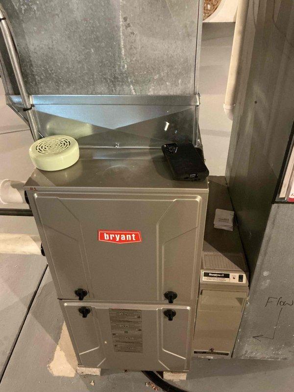 Completed comprehensive cooling tune-up and maintenance on two residential HVAC systems as part of recurring membership agreement. Performed thorough inspection of Bryant furnace system in basement utility area, including evaluation of ductwork connections, plenum assembly, and humidifier components. Conducted full preventive maintenance on both outdoor condenser units, inspecting fan assembly operation, refrigerant levels, electrical connections, and overall system performance to ensure optimal efficiency for the cooling season.