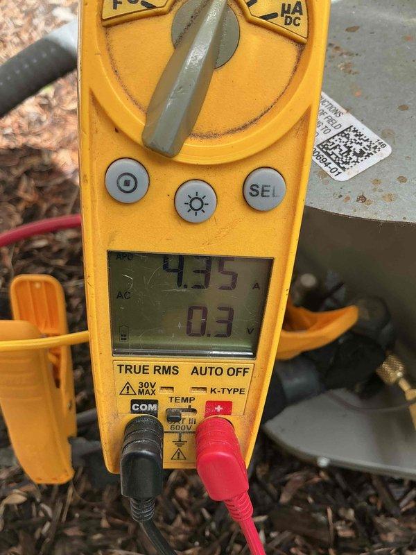 Performed routine maintenance tune-up on HVAC system with arrival in early afternoon. Conducted electrical diagnostics using digital multimeter, measuring amperage draw of 133A and verifying voltage readings to ensure proper system operation and component performance. All measurements fell within acceptable parameters for safe and efficient equipment function.