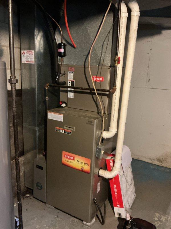 Completed comprehensive tune-up and preventative maintenance on two residential air conditioning systems: one Bryant furnace with air handler located in basement mechanical room, and one Bryant outdoor condenser unit. Performed standard inspection procedures including filter check, electrical connections verification, refrigerant level assessment, condensate drain inspection, and overall system operational testing on both units to ensure optimal performance for the cooling season.