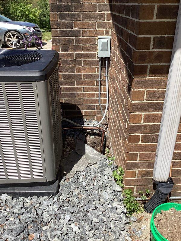 # Complete HVAC System Installation

Completed full residential HVAC system replacement including new furnace, air conditioning unit, and 40-gallon water heater. Installed Lennox outdoor condensing unit on gravel pad with proper clearances from structure. Routed copper refrigerant lines along exterior brick wall using secure mounting brackets and installed electrical disconnect box per code requirements.

Modified venting system by installing new PVC exhaust piping routed through existing chimney chase. Integrated SecureAir filtration system and S40 thermostat for enhanced air quality control and system management. Installed AA700 accessory package to complement system performance.

Coordinated with licensed electrician for all electrical connections and service upgrades. Obtained all required permits prior to installation. Verified proper refrigerant charge, tested all safety controls, and confirmed system operation across all heating and cooling modes. All equipment installed per man