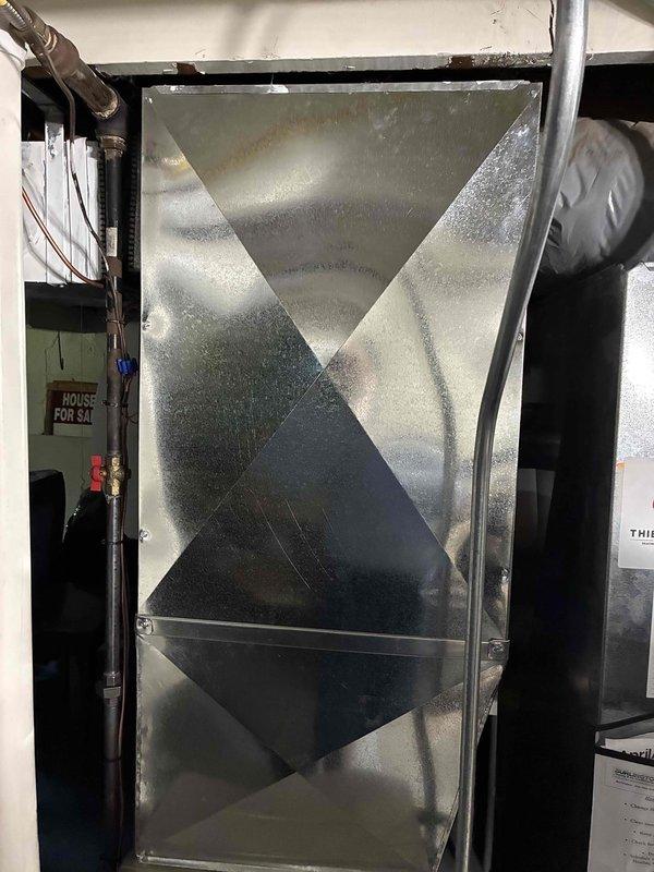Completed return visit to install face plate on supply plenum. Secured and mounted face plate assembly to vertical duct section in mechanical room, ensuring proper seal and professional appearance. Installation verified and system confirmed operational.