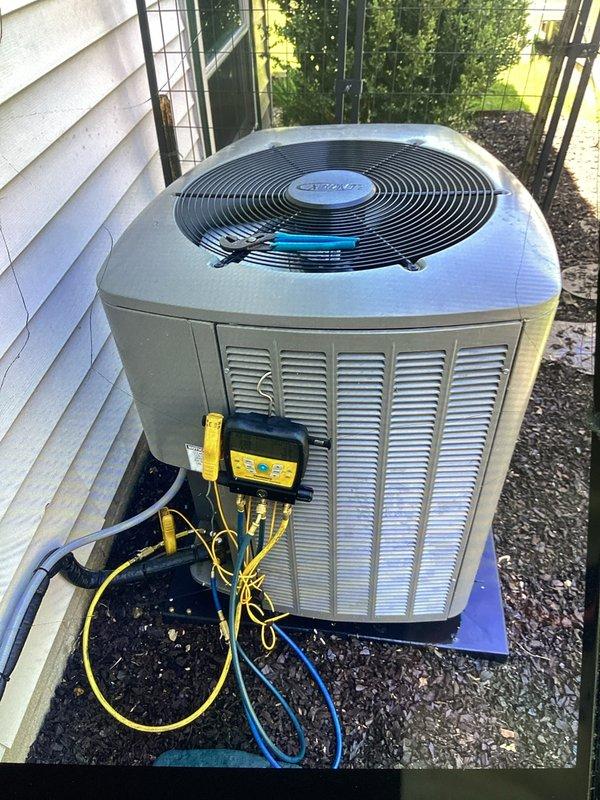 Completed comprehensive air conditioning tune-up and preventive maintenance on Comfortmaker condensing unit using digital manifold gauges to verify R410A refrigerant pressures, temperatures, superheat, and subcooling levels, all of which tested within manufacturer specifications. Installed customer-provided Air Bear 20x25x4 filter as part of scheduled maintenance agreement. System operational and performing efficiently upon completion of service.