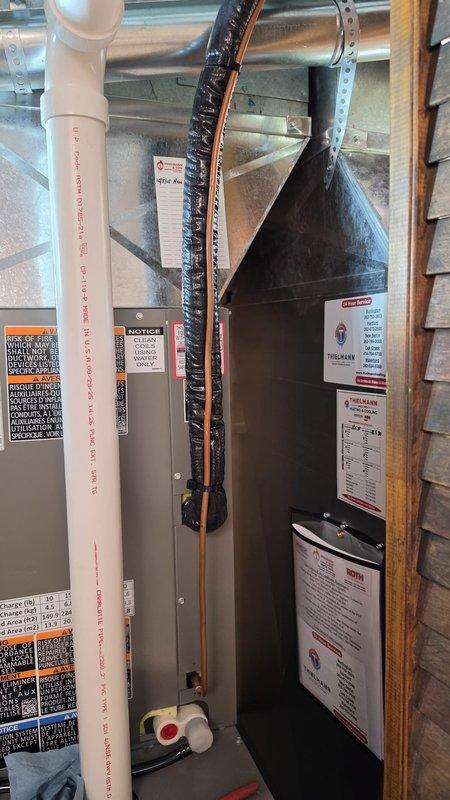 Completed installation of high-side air conditioning components including new evaporator coil integrated with existing furnace system. All refrigerant lines were properly insulated and routed, electrical connections verified, and condensate drainage system installed per manufacturer specifications.