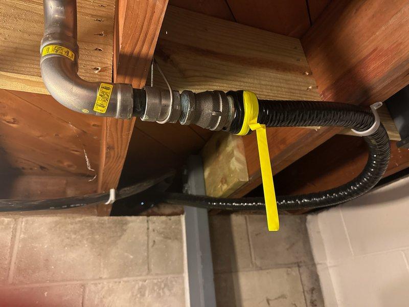 Responded to gas leak tagged by utility company on gas line connection serving generator installed one year prior. Located leak at 1½" threaded pipe connection in gas supply line. Repaired faulty connection, applied proper thread sealant, and pressure tested system to verify leak elimination and safe operation.