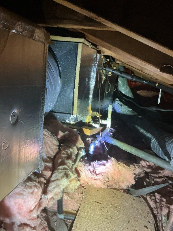 Responded to emergency service call for attic-mounted air handler originally scheduled for routine maintenance. Upon inspection, discovered 36-year-old unit with critically low R22 refrigerant levels, indicating system had reached end of serviceable life. Due to age of equipment, unavailability of R22 refrigerant, and cost-prohibitive nature of repairs, provided comprehensive estimate for complete HVAC system replacement. Documented existing air handler and ductwork configuration in confined attic space with limited accessibility requiring crawl-only access. Recommended full system upgrade to modern, energy-efficient equipment with current refrigerant standards.