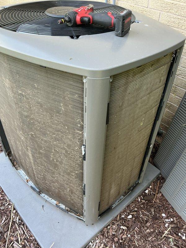 Completed preventive maintenance tune-up on residential split system HVAC equipment, including Lennox furnace and outdoor condensing unit. Performed comprehensive inspection of indoor air handler with refrigerant lines, verified electrical connections and controls, and serviced outdoor condenser unit requiring cleaning of protective grilles showing dirt accumulation and weathering. All components operational and system functioning within normal parameters upon completion.