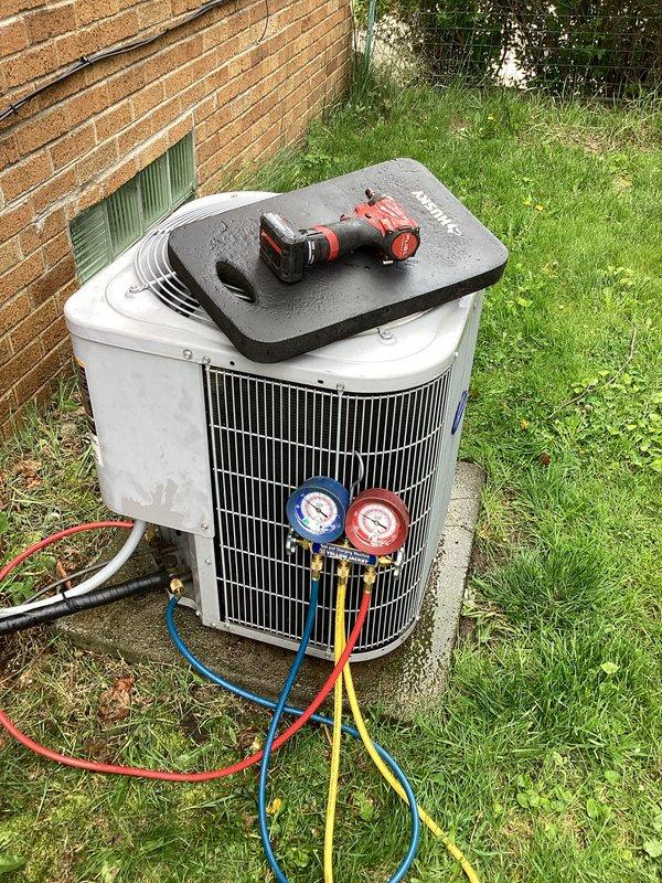 Performed routine air handler tune-up in response to customer report of unusual noise during system operation. Conducted comprehensive inspection of Carrier air handler unit in attic, verifying all mechanical components, electrical connections, and ductwork integrity. Connected manifold gauges to outdoor condensing unit to check refrigerant pressures and system performance, confirming proper operating parameters and resolving noise concern through standard maintenance procedures.