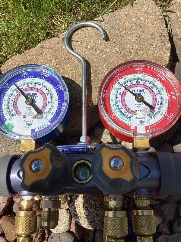 Completed prepaid maintenance visit on residential cooling system. Performed comprehensive system diagnostics using manifold gauges to verify refrigerant pressures and overall system performance. Unit operating within normal parameters with all components functioning properly at time of inspection.