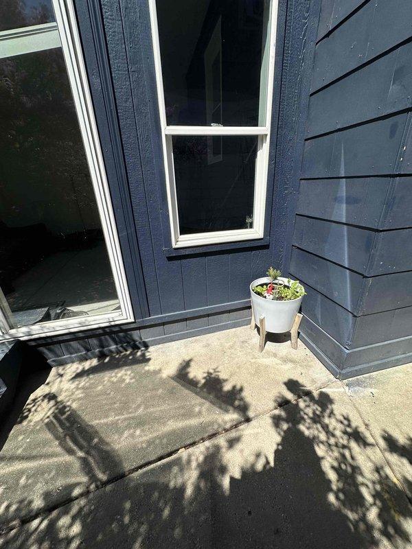Conducted on-site evaluation for mini-split installation at residential property. Assessed exterior wall locations and porch area for optimal placement of outdoor condenser unit and indoor air handler, taking measurements and documenting existing conditions to prepare detailed installation proposal.