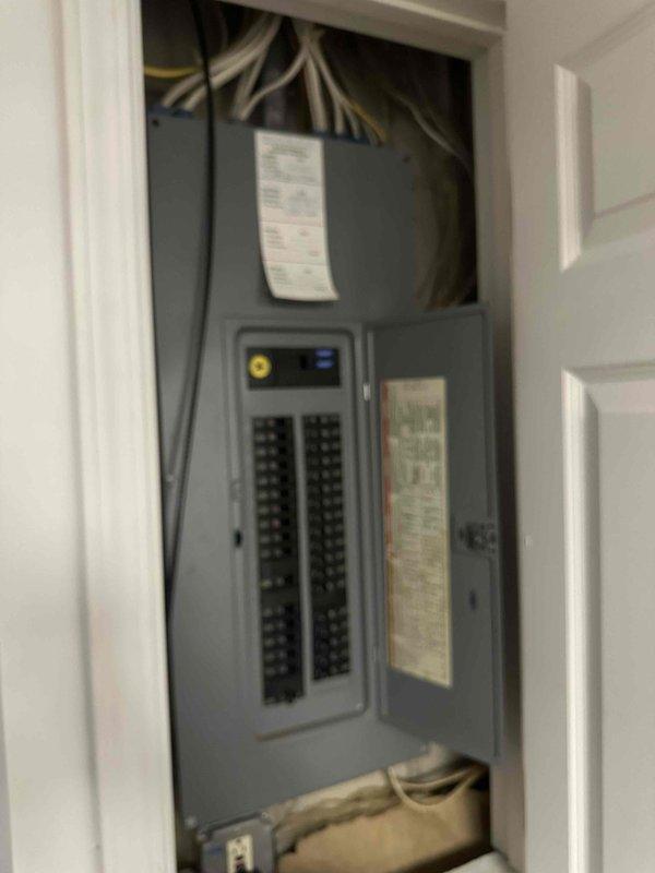 Conducted estimate for replacement of 25-year-old furnace and air conditioning system currently located in basement. Customer requesting Lennox equipment upgrade; existing system operational but at end of service life. Documented current electrical panel configuration and exterior condensing unit for replacement specifications.