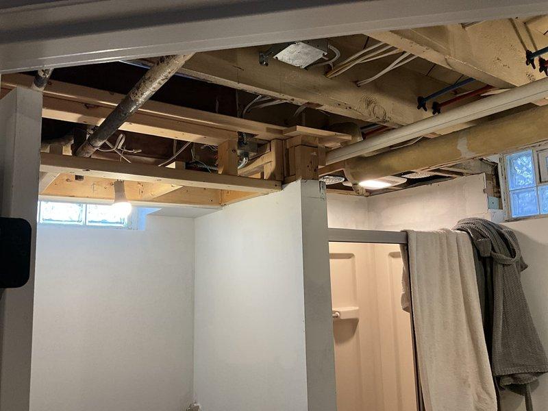 Conducted comprehensive assessment of existing HVAC system in unfinished basement area to provide replacement estimate. Evaluated current ductwork configuration, mechanical system placement, and structural considerations including exposed ceiling joists and available clearances for new equipment installation. Documented existing conditions including utility placement and access points to determine optimal equipment sizing and positioning for replacement system.