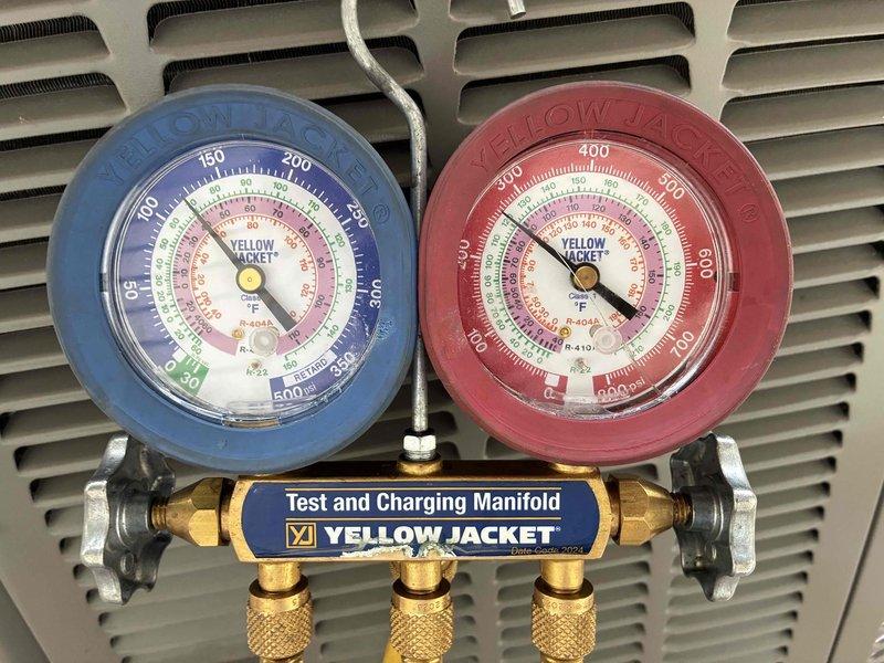 Performed seasonal air conditioning tune-up on rooftop-mounted Lennox unit. Connected manifold gauge set to verify refrigerant pressures and system operation, confirming all parameters within manufacturer specifications. Unit tested and left in proper working condition.