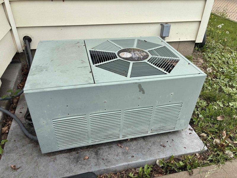 Responded to no cooling complaint on aging residential air conditioning system. Upon arrival, performed diagnostic evaluation of outdoor condenser unit showing signs of weathering and age-related deterioration. Connected manifold gauge set to measure system pressures and assess refrigerant charge levels. Gauges indicated abnormal operating pressures consistent with potential refrigerant loss or compressor issues. Advised customer that unit has reached end of serviceable life expectancy and temporary repair may not be feasible or cost-effective. Customer acknowledged plans to proceed with full system replacement and requested diagnostic findings to inform replacement decision.