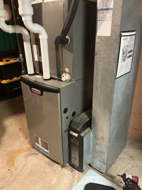 Completed comprehensive AC tune-up on residential Lennox system, including inspection of outdoor condenser unit and indoor furnace components. Performed standard maintenance procedures, checked refrigerant levels, cleaned condenser coils, inspected electrical connections, and verified proper airflow through the system. All equipment operating within normal parameters upon completion.