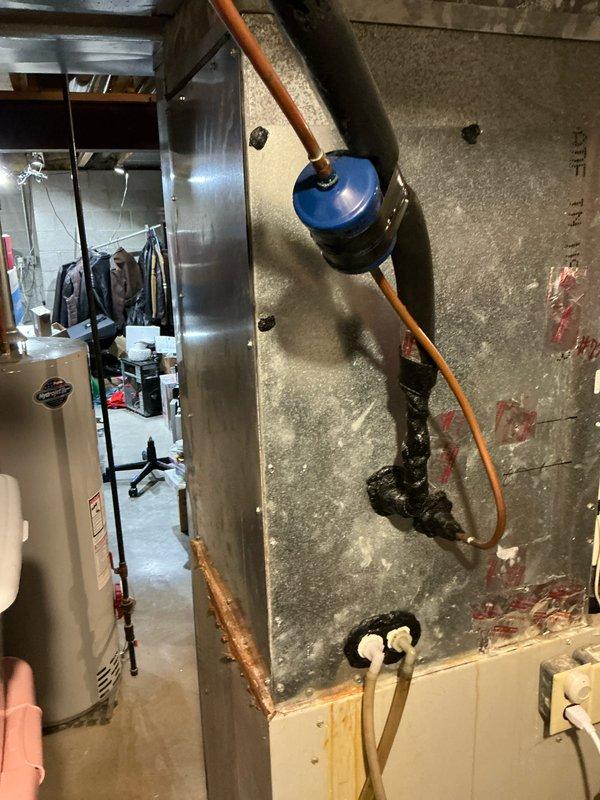 Conducted comprehensive assessment of existing HVAC system for replacement estimate including furnace and zoning capabilities. Documented current Heil furnace installation, associated ductwork, plumbing connections, and mechanical room layout to provide accurate replacement specifications and zoning integration options.