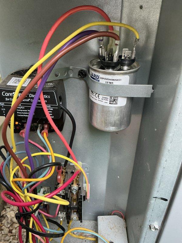 Responded to no cooling call on 10+ year old Carrier system. Upon arrival, unit was running but delivering only ambient air with no refrigeration. Diagnosed failed dual run capacitor in outdoor condensing unit. Replaced defective capacitor with properly rated replacement, restoring compressor and condenser fan motor operation. Verified system cooling performance and proper amp draw on all components before departure.