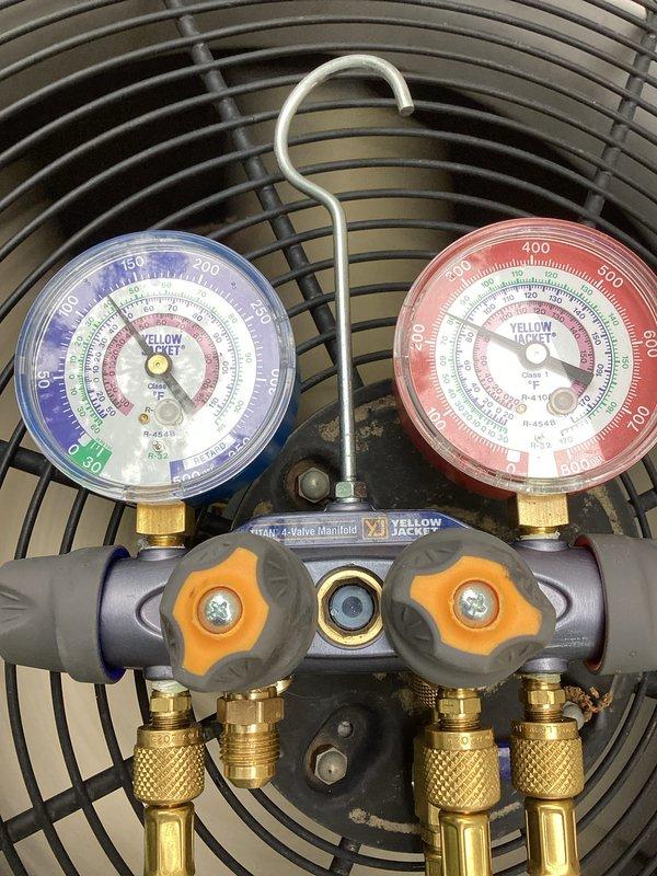 Completed preventative maintenance cooling tune-up as part of recurring membership agreement. Performed comprehensive system inspection in basement, checking furnace and HVAC equipment operation, verifying proper airflow through ductwork, and testing refrigerant pressures using manifold gauges on outdoor condenser unit. All components operating within normal parameters with no deficiencies noted.