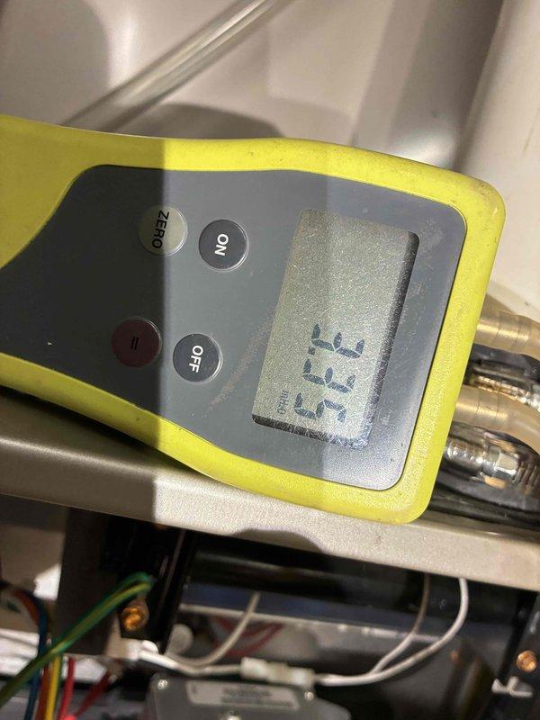 Completed comprehensive tune-up on Infinity furnace system as part of recent AC installation package. Performed standard maintenance protocol including air filter replacement, system diagnostics with digital measurement tools showing operational reading of 33.3, and thorough inspection of internal components including copper refrigerant lines and electrical connections to ensure optimal performance and efficiency.