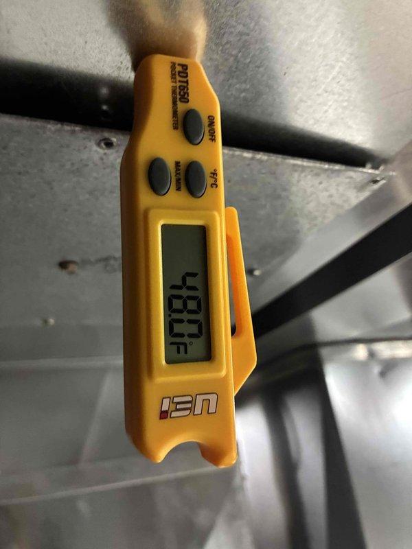 Completed prepaid cooling maintenance visit on residential HVAC system. Performed standard diagnostic testing including temperature measurements, which indicated system operating at 430°F at tested component. Inspected outdoor condensing unit, noting weathered exterior housing with visible deterioration and debris accumulation on protective cover, though unit remains operational with adequate ventilation through lower mesh components.