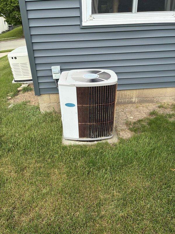 Provided estimate for complete HVAC system replacement including natural gas furnace and air conditioning condenser unit, both currently operational but nearing end of serviceable life with equipment dating from approximately 1995. Assessed existing basement-mounted furnace and exterior-mounted AC condenser unit on concrete pad, documented current system configuration, and presented replacement options to bring heating and cooling systems up to current efficiency standards.