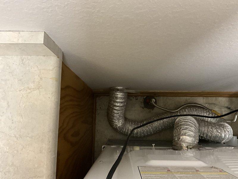 Reconfigured microwave hood ducting to accommodate rear-vented microwave installation in remodeled kitchen, relocated dryer vent to align with new laundry room layout, and extended ductwork system into new addition space. Installed flexible aluminum ducting through existing utility areas and basement spaces to ensure proper ventilation for all relocated appliances. All ductwork was routed to meet code requirements and maintain efficient airflow throughout the modified floor plan.