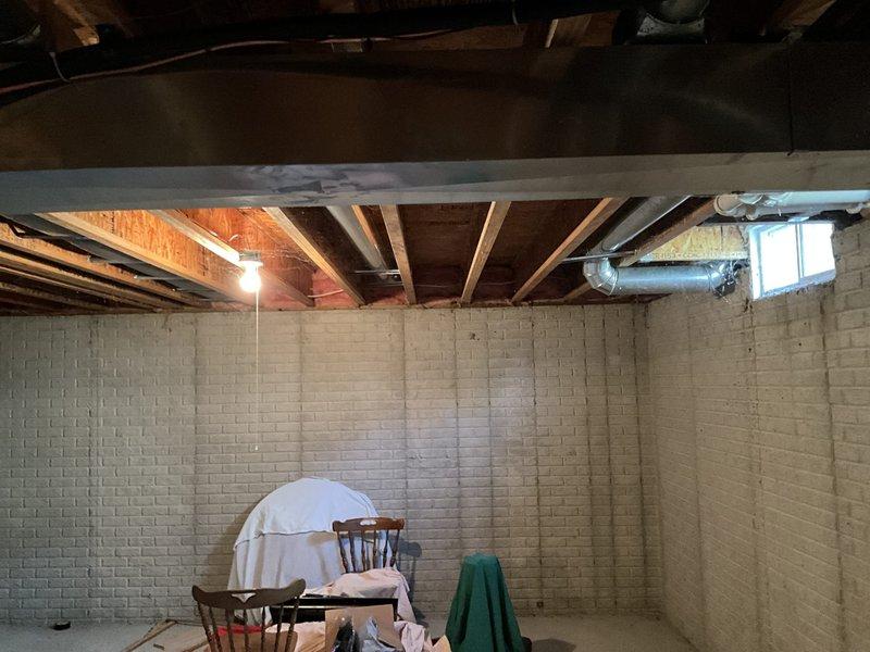 Reconfigured microwave hood ducting to accommodate rear-vented microwave installation in remodeled kitchen, relocated dryer vent to align with new laundry room layout, and extended ductwork system into new addition space. Installed flexible aluminum ducting through existing utility areas and basement spaces to ensure proper ventilation for all relocated appliances. All ductwork was routed to meet code requirements and maintain efficient airflow throughout the modified floor plan.