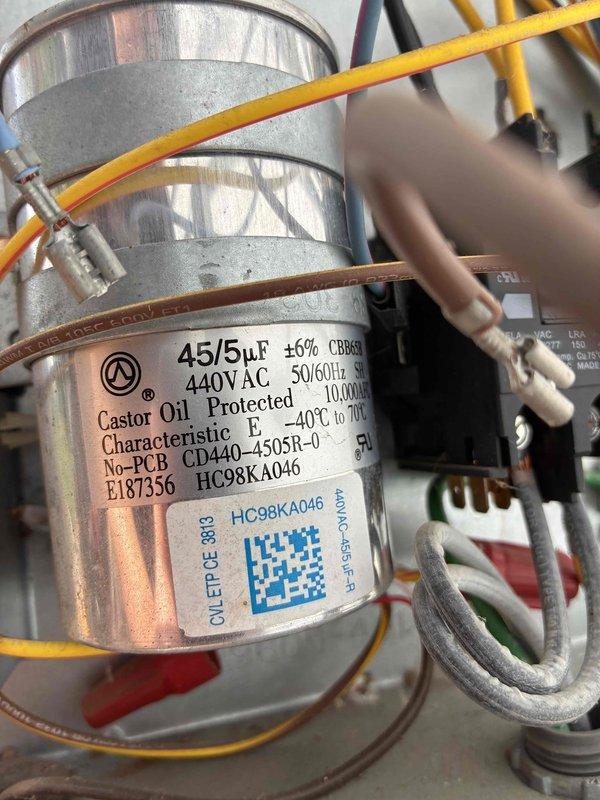 Completed routine cooling season maintenance visit as part of membership agreement. Inspected and photographed dual-run capacitor rated at 45/5 MFD 440V AC, verified proper electrical connections and component functionality. All system components found operating within normal parameters, wiring connections secure, and unit ready for continued seasonal operation.