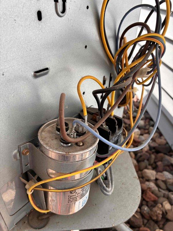 Completed routine cooling season maintenance visit as part of membership agreement. Inspected and photographed dual-run capacitor rated at 45/5 MFD 440V AC, verified proper electrical connections and component functionality. All system components found operating within normal parameters, wiring connections secure, and unit ready for continued seasonal operation.