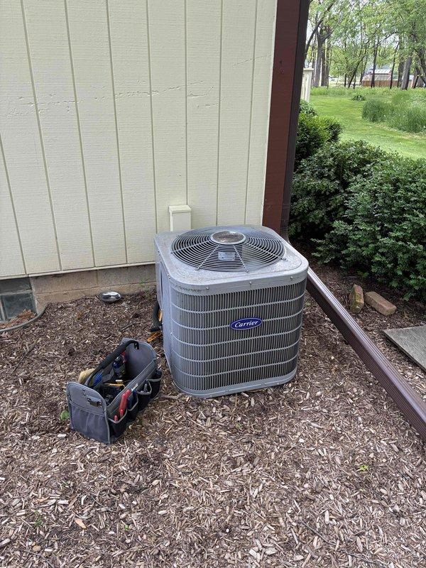 Completed comprehensive AC tune-up on Carrier outdoor condensing unit and performed furnace filter replacement on indoor Carrier furnace system. All components inspected, tested, and verified operating within normal parameters for optimal system performance.