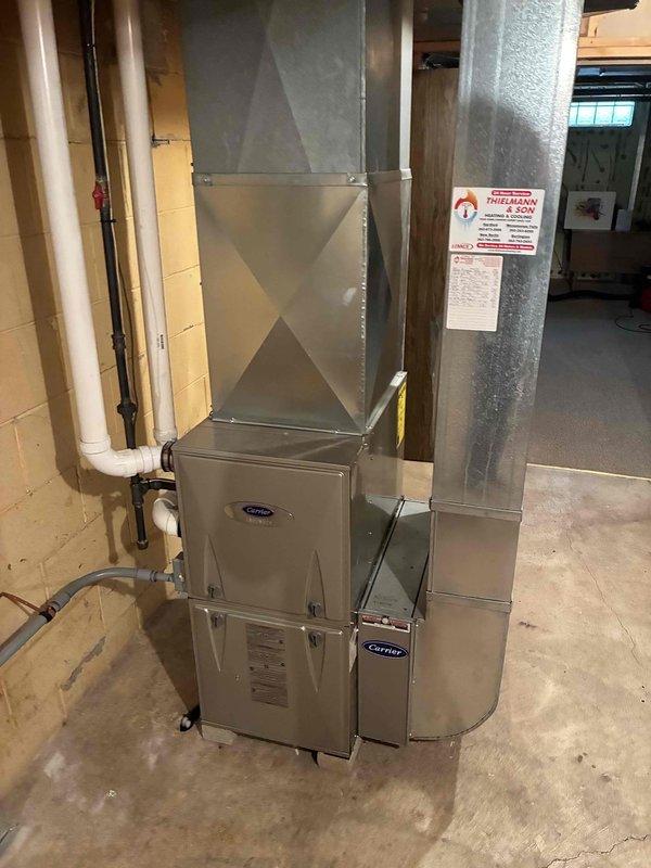 Completed comprehensive AC tune-up on Carrier outdoor condensing unit and performed furnace filter replacement on indoor Carrier furnace system. All components inspected, tested, and verified operating within normal parameters for optimal system performance.
