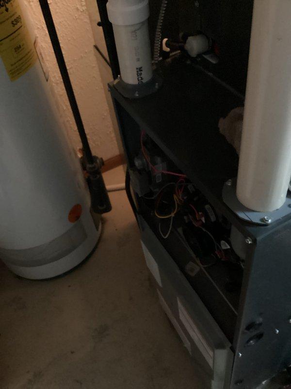 Completed comprehensive furnace and AC tune-up maintenance service. Upon arrival, confirmed that no UV lamp system is present in the equipment despite prior notification requesting UV lamp replacement. Performed standard preventive maintenance procedures on both heating and cooling systems, inspected all mechanical components, verified proper operation of HVAC equipment and water heater in utility space.