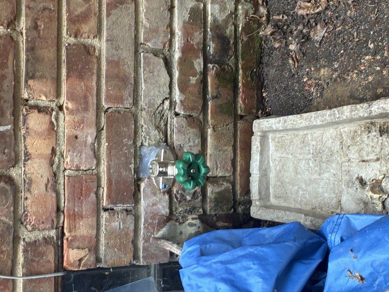 Installed new frost-free hose bib on exterior brick wall with copper supply line connection routed through basement utility area. Secured copper piping to interior concrete block wall with proper support brackets, completed soldered joints, and verified system for proper operation and leak-free performance.