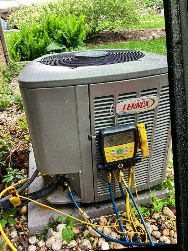 Performed comprehensive tune-up and diagnostic evaluation on Lennox Elite outdoor condensing unit. Connected manifold gauge set to measure system pressures and temperatures, verifying proper refrigerant charge and overall system performance. Unit operating within manufacturer specifications at time of inspection.