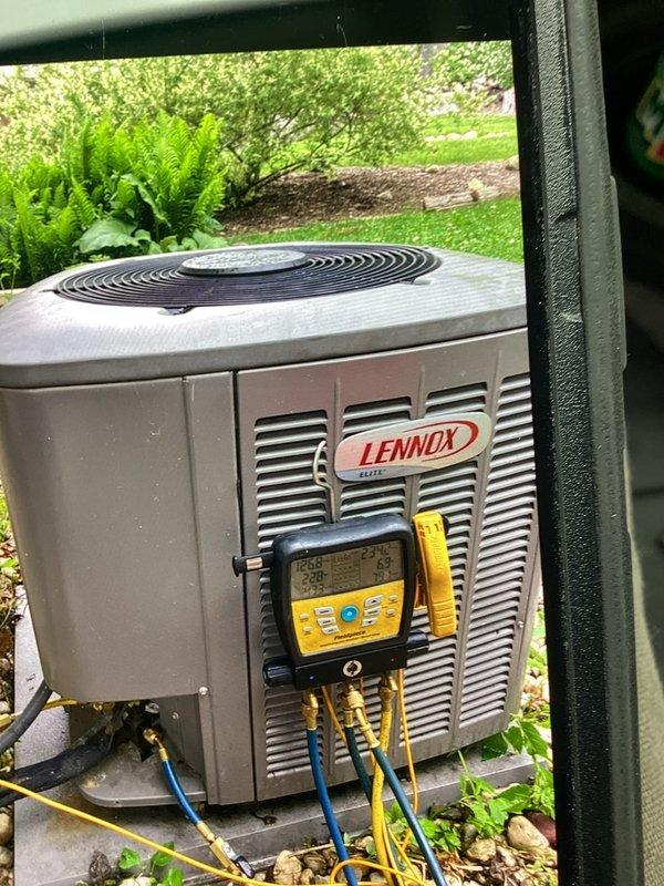 Performed comprehensive tune-up and diagnostic evaluation on Lennox Elite outdoor condensing unit. Connected manifold gauge set to measure system pressures and temperatures, verifying proper refrigerant charge and overall system performance. Unit operating within manufacturer specifications at time of inspection.