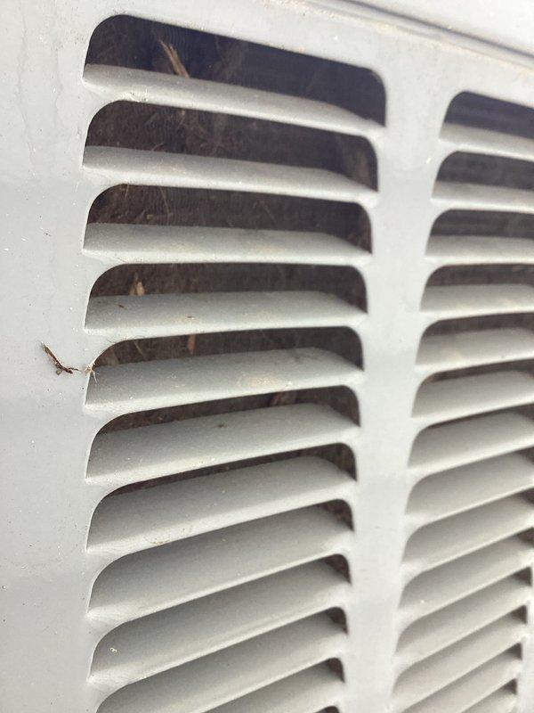Completed scheduled biannual air conditioning tune-up and preventive maintenance as part of recurring service agreement. Inspected system components, documented heavily soiled return air filter and debris accumulation in ventilation grilles requiring attention to maintain optimal airflow and system efficiency.