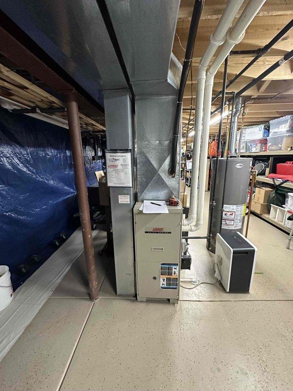 Completed comprehensive estimate for full HVAC system replacement in residential basement mechanical room. Assessed existing Lennox furnace unit and air conditioning system, evaluated current ductwork configuration including metal plenum and distribution system, and documented existing equipment layout and clearances. Provided homeowner with replacement options for both heating and cooling equipment suitable for the existing infrastructure and space requirements.