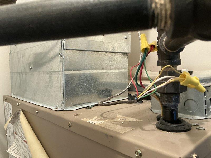 Responded to emergency service call and performed comprehensive evaluation of existing MagicPak HVAC system. Documented current equipment condition including interior components, gas valve assembly, electrical connections, and ductwork configuration to provide detailed replacement estimate for aging unit showing signs of wear and operational concerns.
