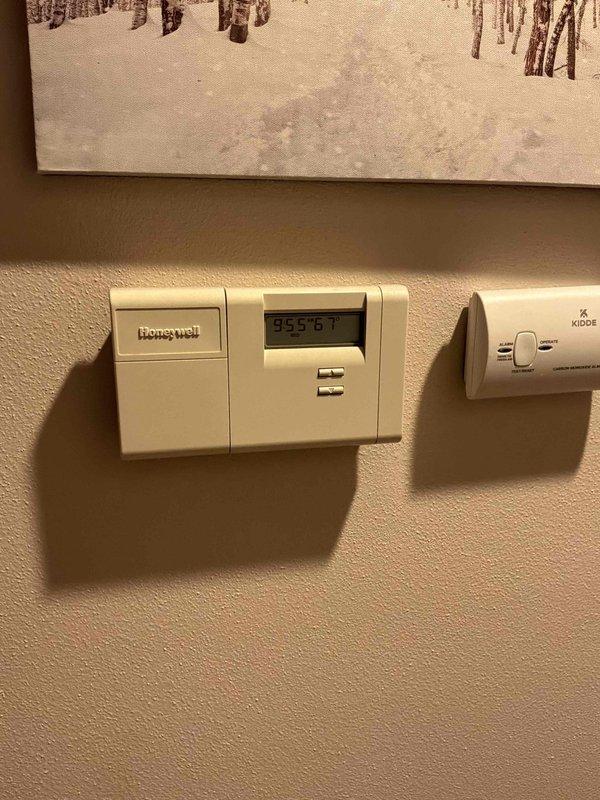 Completed estimate for replacement of existing natural gas furnace and installation of new air conditioning system in basement location. Documented current system configuration including thermostat setup and electrical panel specifications to determine equipment requirements and installation parameters for proposed HVAC system upgrade.