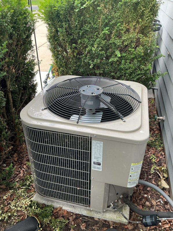 Completed routine cooling season maintenance visit for residential split system air conditioning unit. Performed comprehensive inspection of outdoor condensing unit, verified proper operation of condenser fan motor and compressor, checked refrigerant levels and system pressures, cleaned condenser coil fins, and inspected electrical connections and components. Unit found operating within normal parameters with no deficiencies noted at time of service.