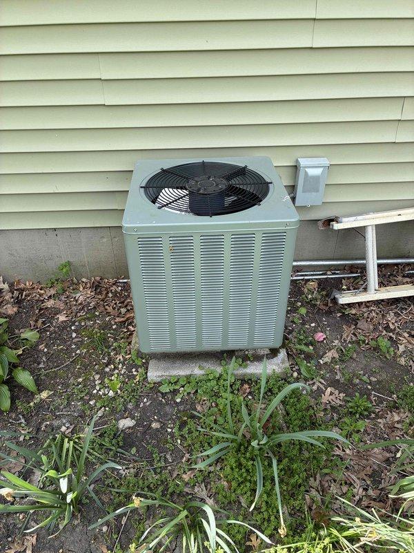 Conducted estimate for natural gas furnace replacement in basement. Existing furnace is operational but aging, and customer prefers proactive replacement to avoid emergency situation. Documented existing HVAC system including outdoor condenser unit and electrical panel configuration for replacement planning.