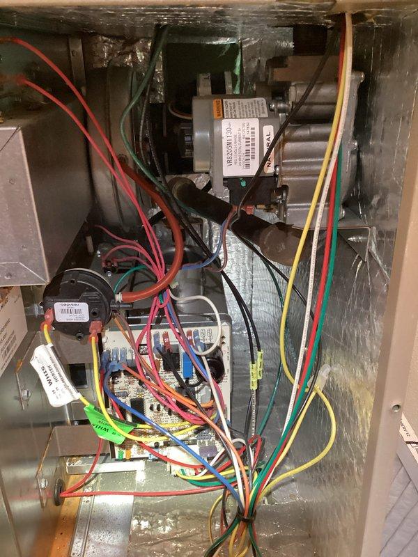 Performed comprehensive tune-up on MagicPak HVAC system, including inspection of gas valve assembly, control board, and evaporator coil components. Accessed interior cabinet to verify proper electrical connections, examined blower motor operation, and assessed heat exchanger condition with all components found operating within manufacturer specifications. Completed system evaluation with no immediate repairs required.