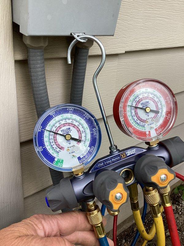 Completed routine cooling system maintenance under membership agreement. Connected manifold gauge set to outdoor condensing unit and performed refrigerant pressure diagnostics on both high and low sides. Verified system pressures were within manufacturer specifications. Conducted standard tune-up procedures including visual inspection of condenser unit, electrical connections, and refrigerant lines. All components operating normally with no deficiencies noted at time of service.