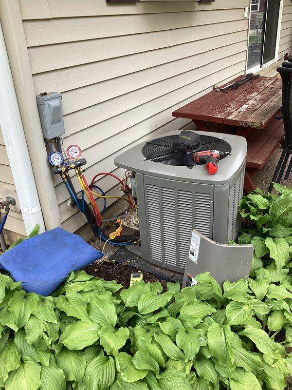 Completed routine cooling system maintenance under membership agreement. Connected manifold gauge set to outdoor condensing unit and performed refrigerant pressure diagnostics on both high and low sides. Verified system pressures were within manufacturer specifications. Conducted standard tune-up procedures including visual inspection of condenser unit, electrical connections, and refrigerant lines. All components operating normally with no deficiencies noted at time of service.