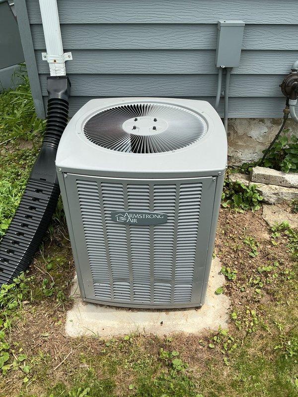 Completed routine maintenance tune-up on Armstrong brand air conditioning system as part of membership cooling visit. Performed standard inspection of outdoor condenser unit and indoor evaporator coil (Model EM1P30GQ-1, Serial 6015C36963), verified refrigerant levels, checked electrical connections, and ensured system operational efficiency. All components found in proper working condition with no issues identified.