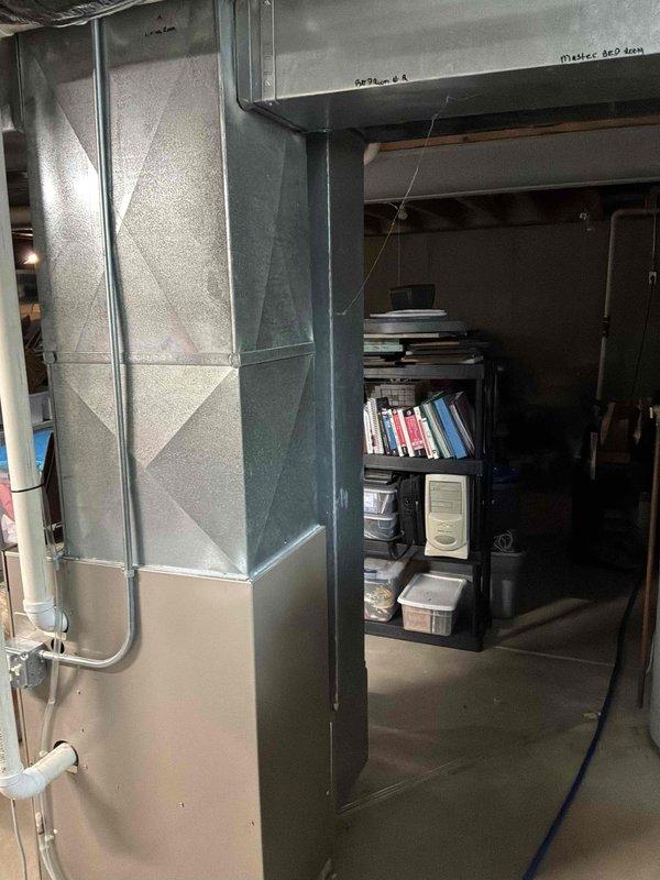 Conducted estimate for complete HVAC system replacement including furnace and air conditioning unit, both over 20 years old. Assessed existing equipment and ductwork in basement installation, noting Nest thermostat displaying E74H5 error code indicating intermittent power issues on the C-wire, though system remains operational at time of inspection. Provided Carrier equipment replacement options to address aging system and resolve thermostat power concerns.