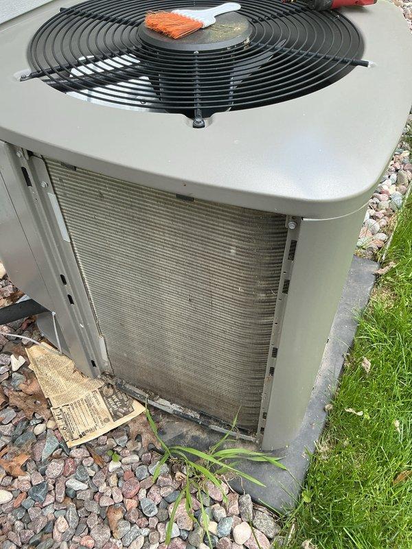 Completed annual air conditioning tune-up on Lennox XC13N024-230A09 outdoor condensing unit containing R-410A refrigerant. Performed comprehensive preventive maintenance including cleaning of condenser coils, inspection of electrical components, verification of proper refrigerant charge (factory charge 3 lbs 12 oz), and testing of system operation to ensure optimal performance for the cooling season.