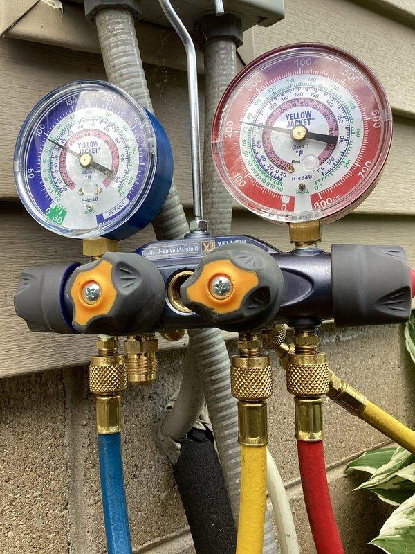 Completed routine cooling season maintenance visit under membership agreement. Performed comprehensive AC tune-up including system inspection in crawl space installation, verified proper operation of air handler and ductwork connections. Measured refrigerant pressures using manifold gauges at outdoor condensing unit, confirmed system operating within manufacturer specifications. All electrical connections, copper refrigerant lines, and ductwork supports inspected and found secure. Provided Healthy Climate HC16-28 filter as requested for system air quality maintenance.